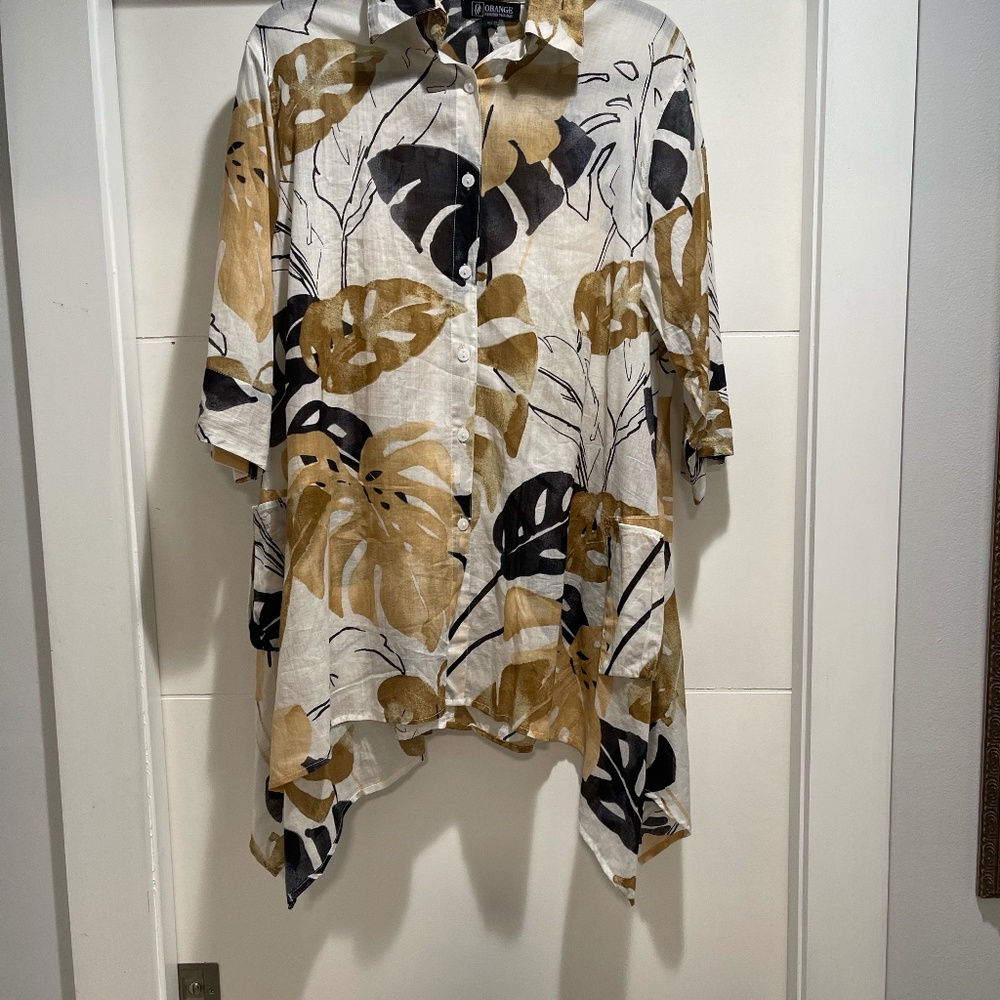Orange Fashion Vllage Shirt.